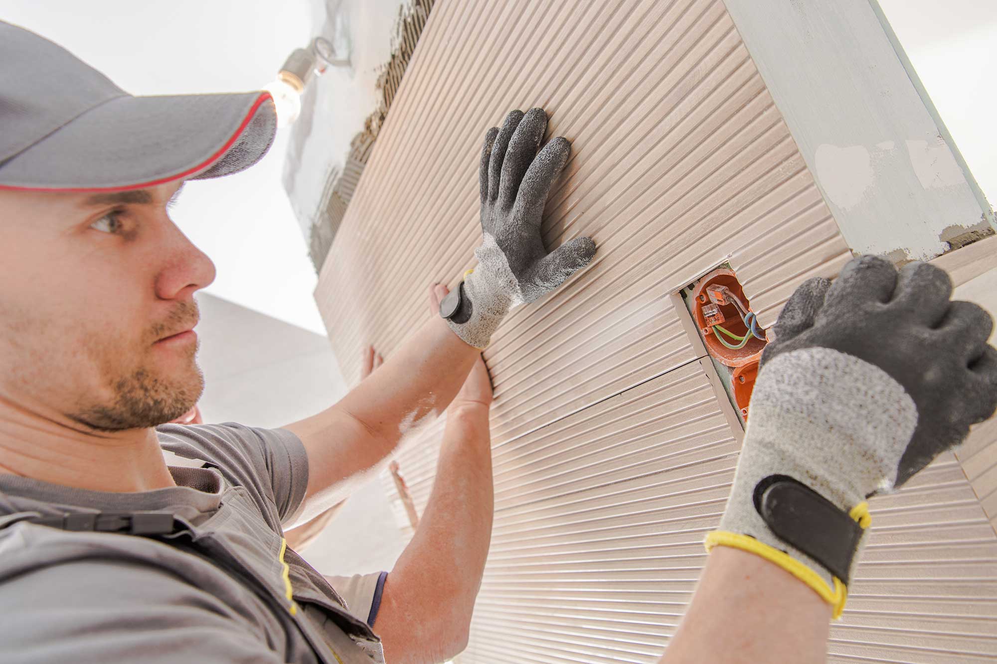 worker-installing-large-tile-2025-03-15-03-23-29-utc
